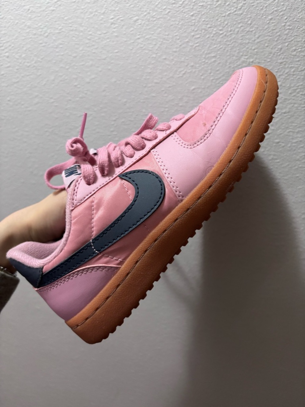 Nike Pink Low-Top Sneaker with Navy Swoosh and Gum Sole